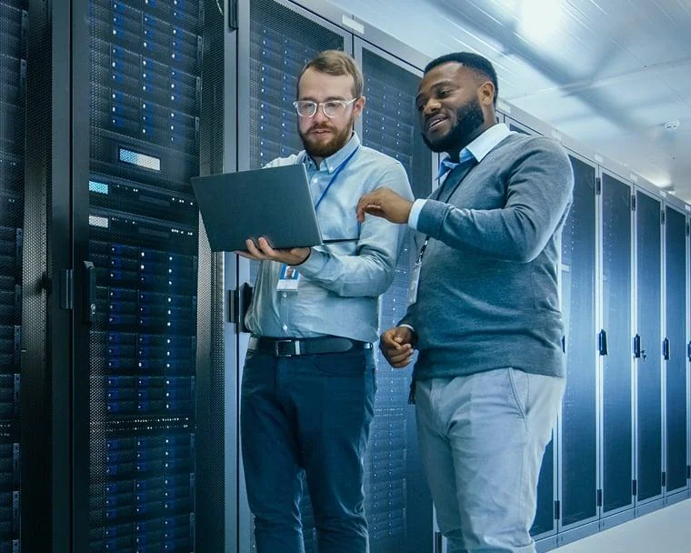 IT professionals collaborating in a technology workspace